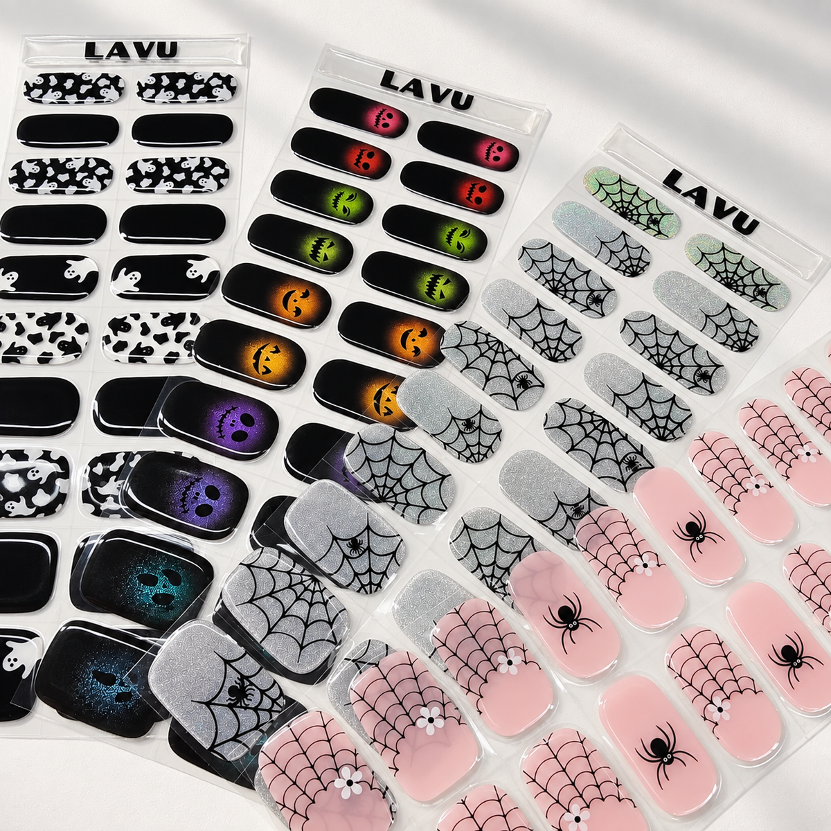 LAVU Halloween semi-cured gel nail strips featuring spiderwebs, ghosts and colourful spooky designs