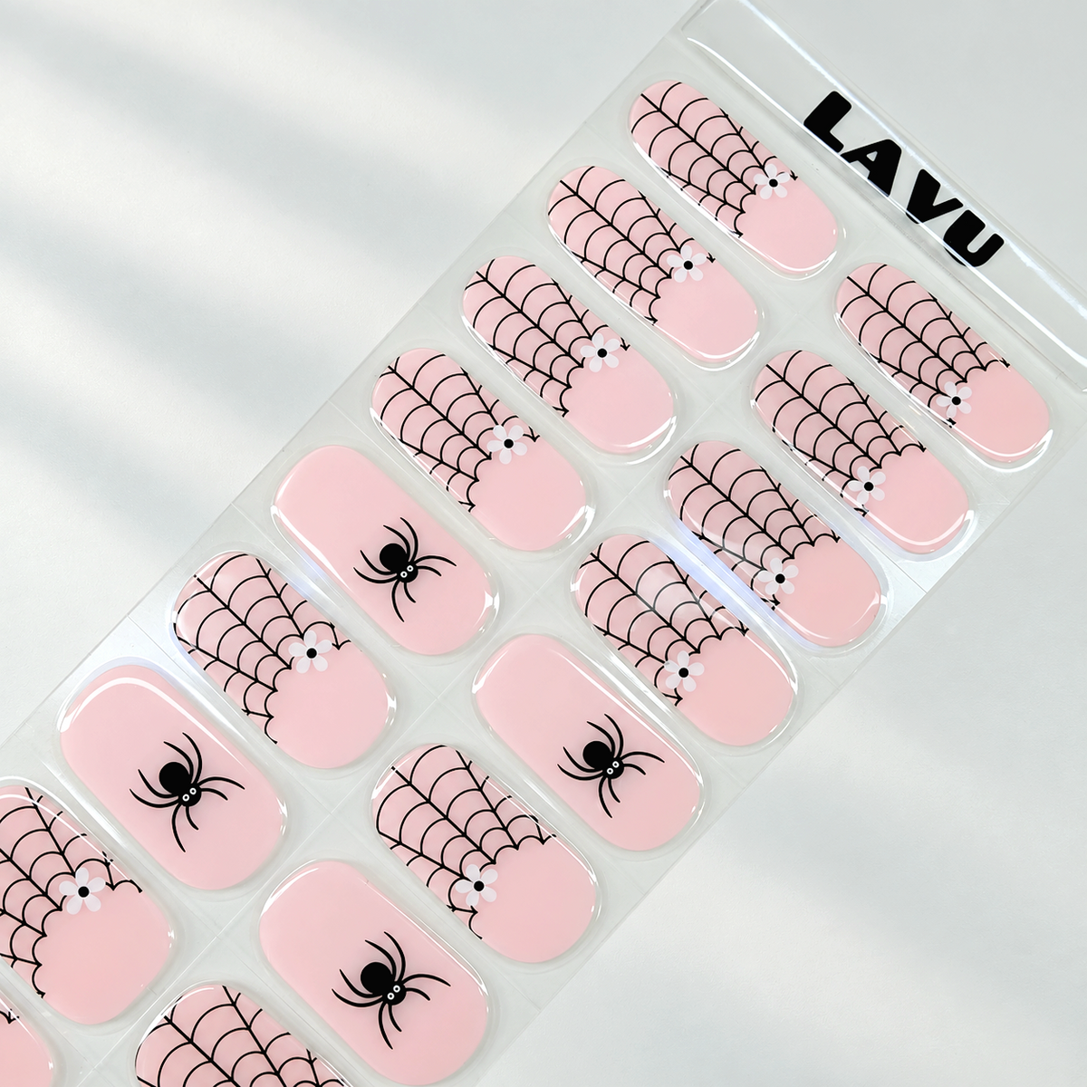 Pink Web pink spiderweb and ghost Halloween semi-cured gel nail strips by LAVU