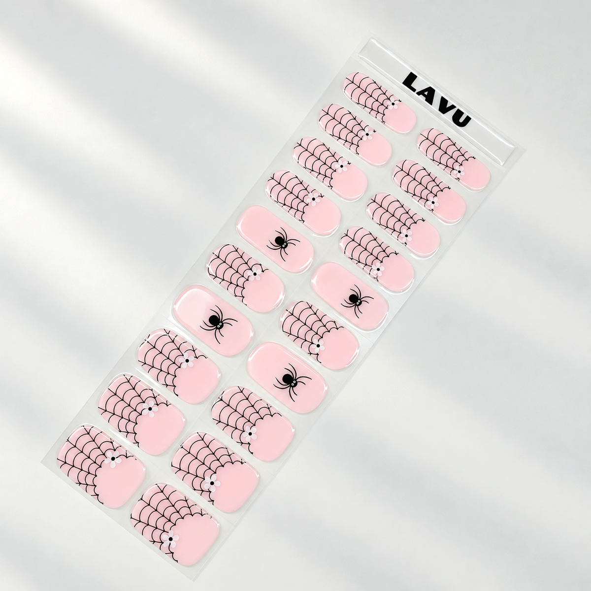 Pink Web pink spiderweb and ghost Halloween semi-cured gel nail strips by LAVU