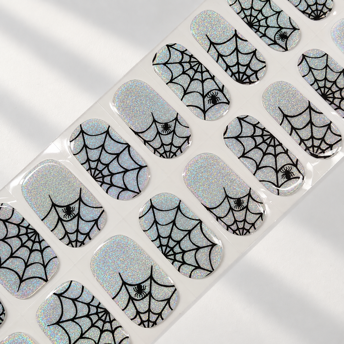 Silver Web holographic spiderweb Halloween semi-cured gel nail strips by LAVU