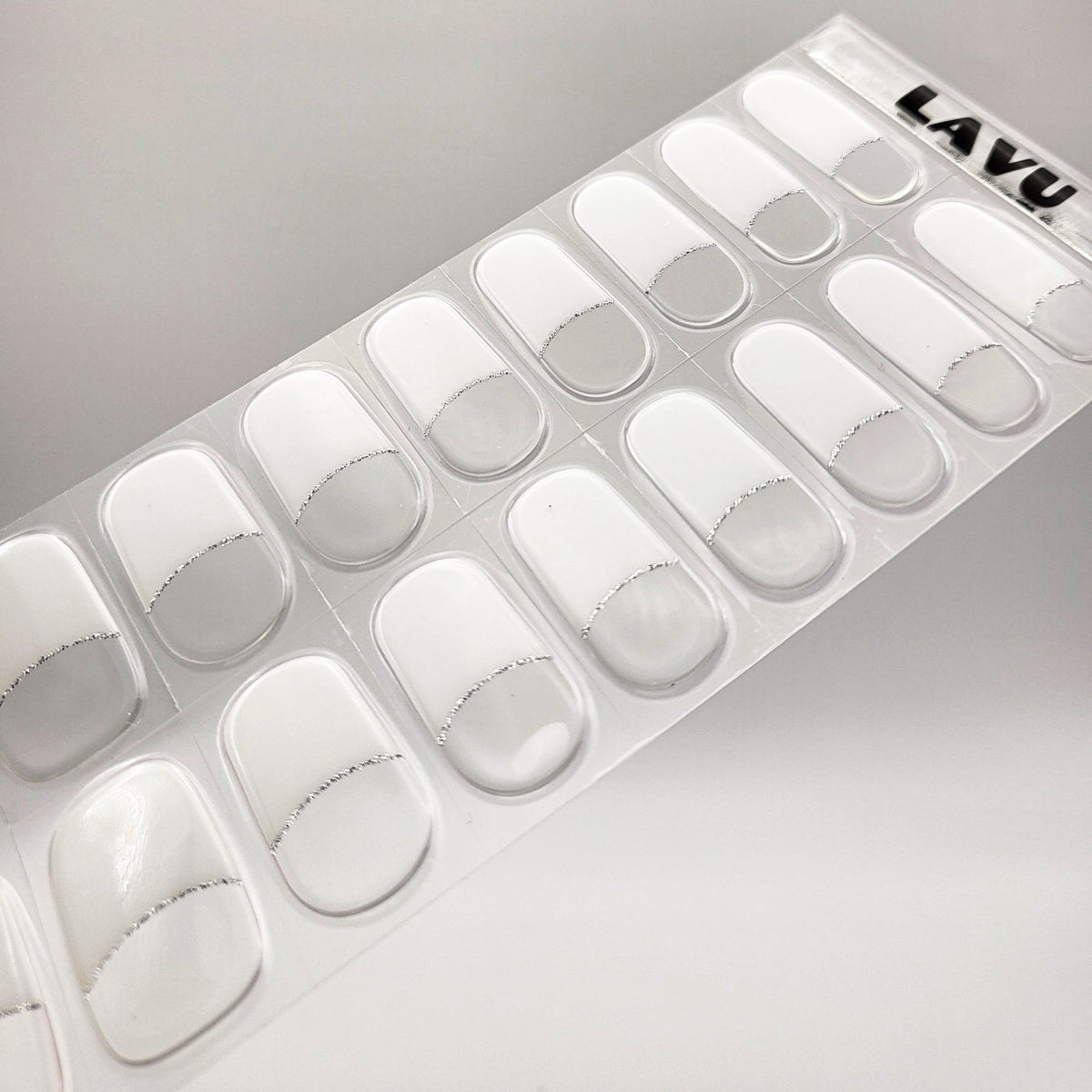 White French with silver glitter line semi-cured gel nail strips by LAVU