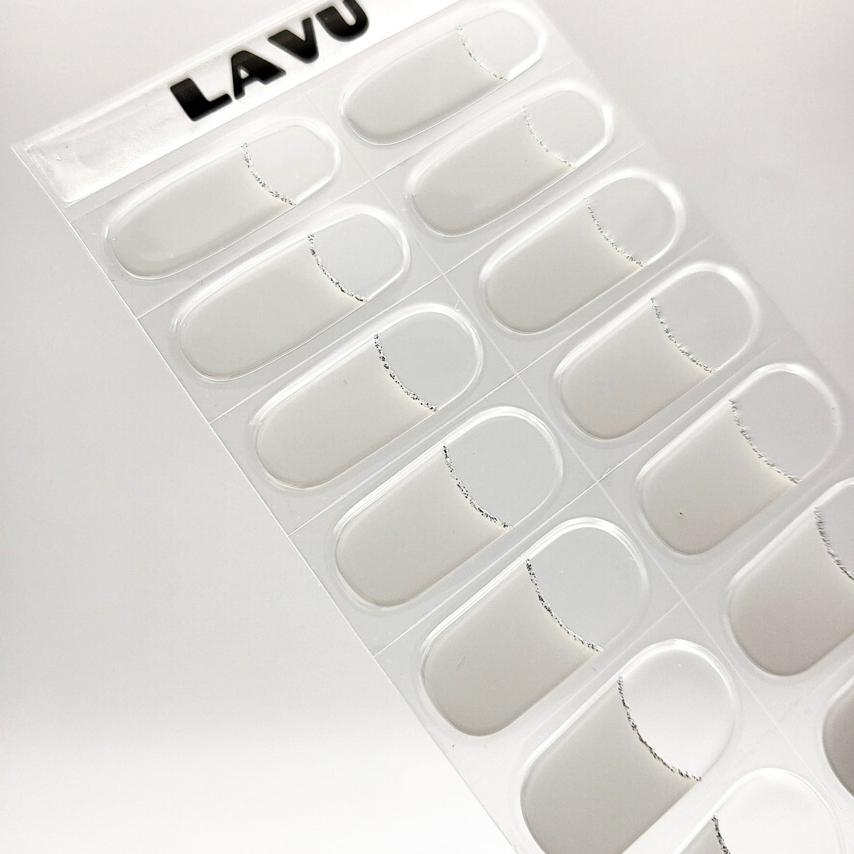 White French with silver glitter line semi-cured gel nail strips by LAVU