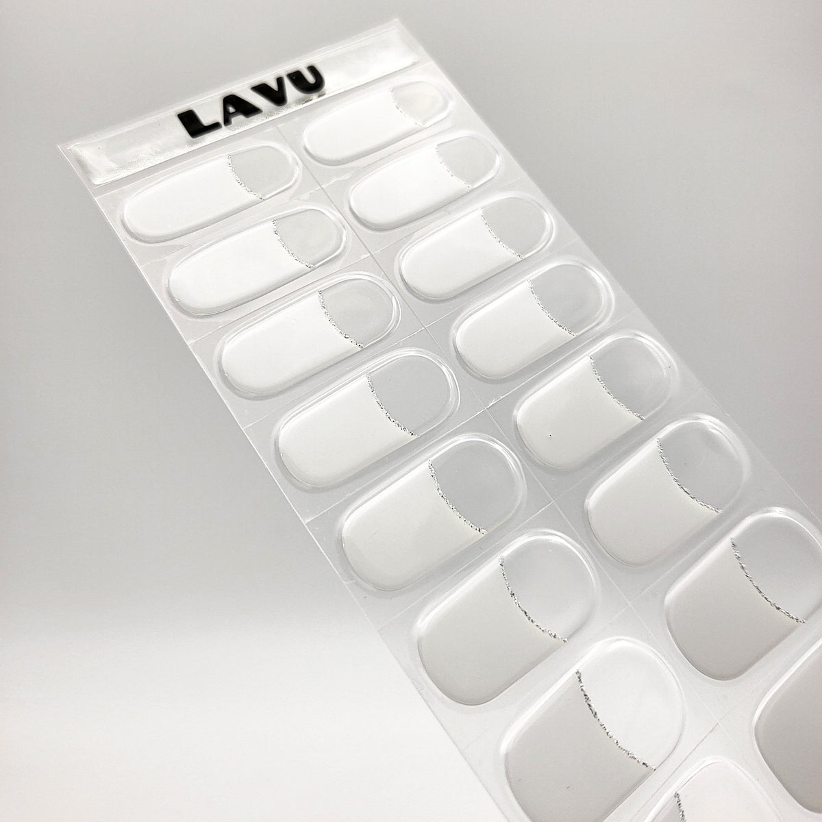 White French with silver glitter line semi-cured gel nail strips by LAVU