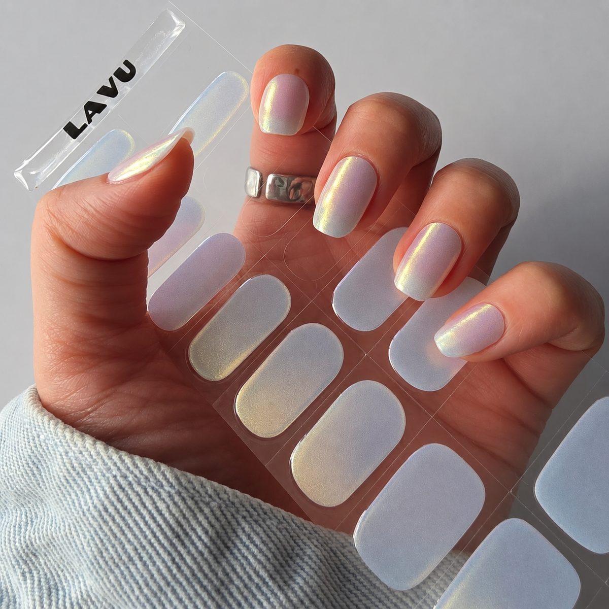 Aurora Ivory iridescent semi-cured gel nail strips by LAVU