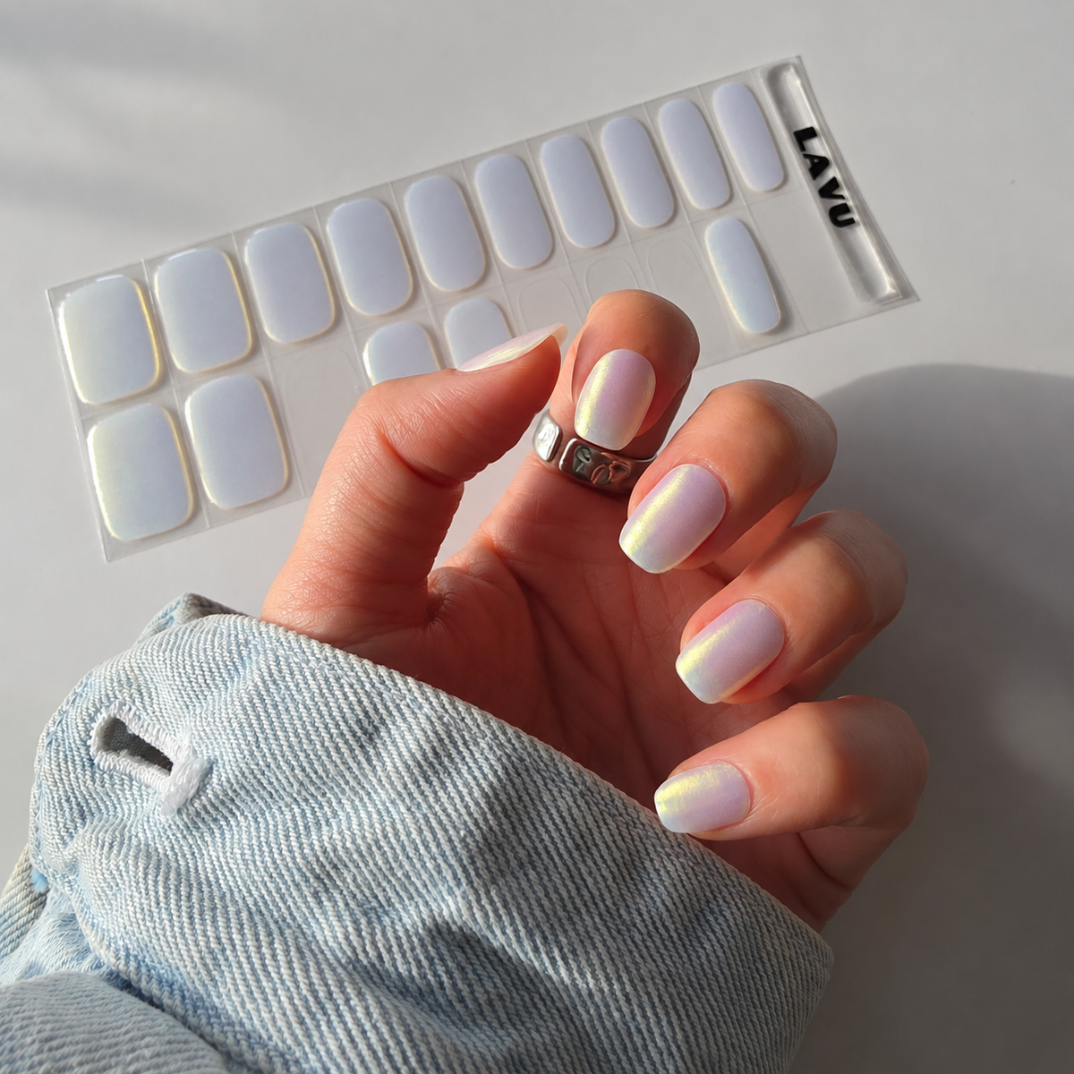 Aurora Ivory iridescent semi-cured gel nail strips by LAVU